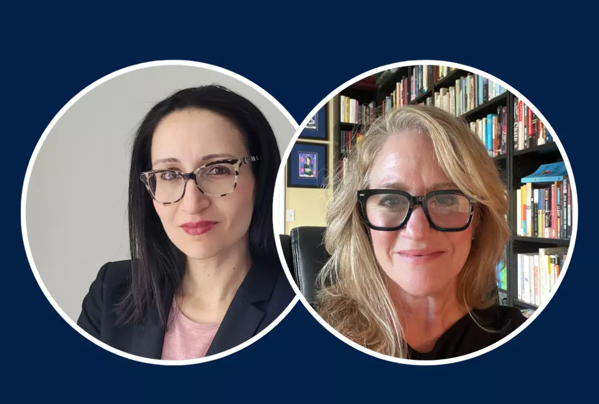 Dark haired woman with glasses and Blonde haired woman with glasses